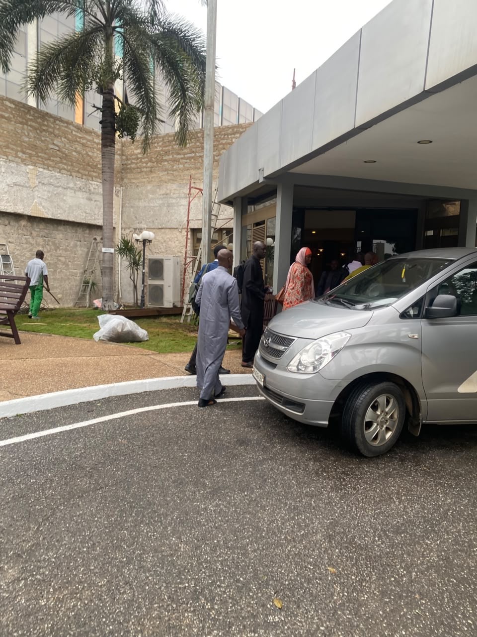 Delegates being escorted to an Allons van at a venue